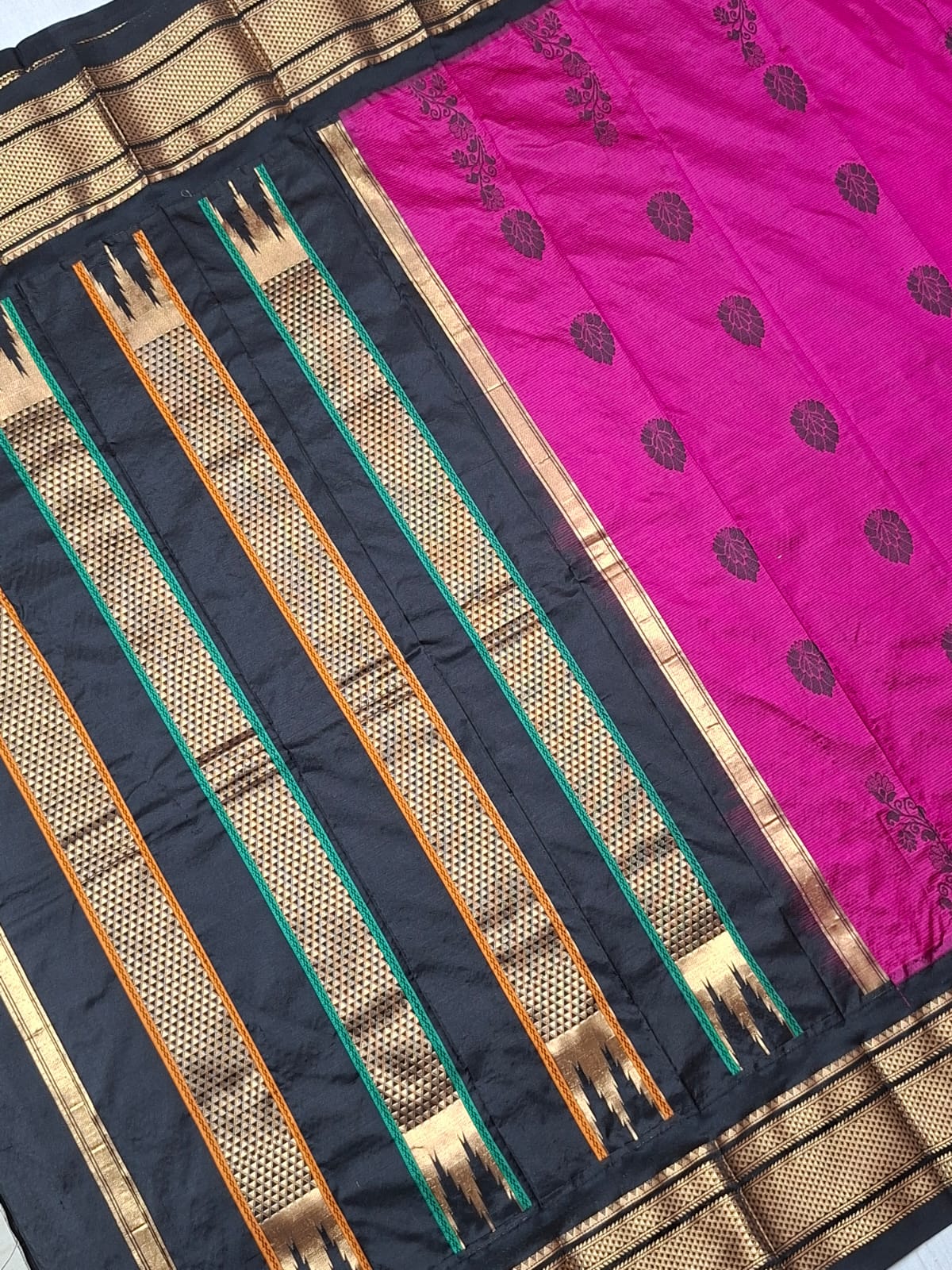 Rani pink & black Ilkal saree with with floral weavings