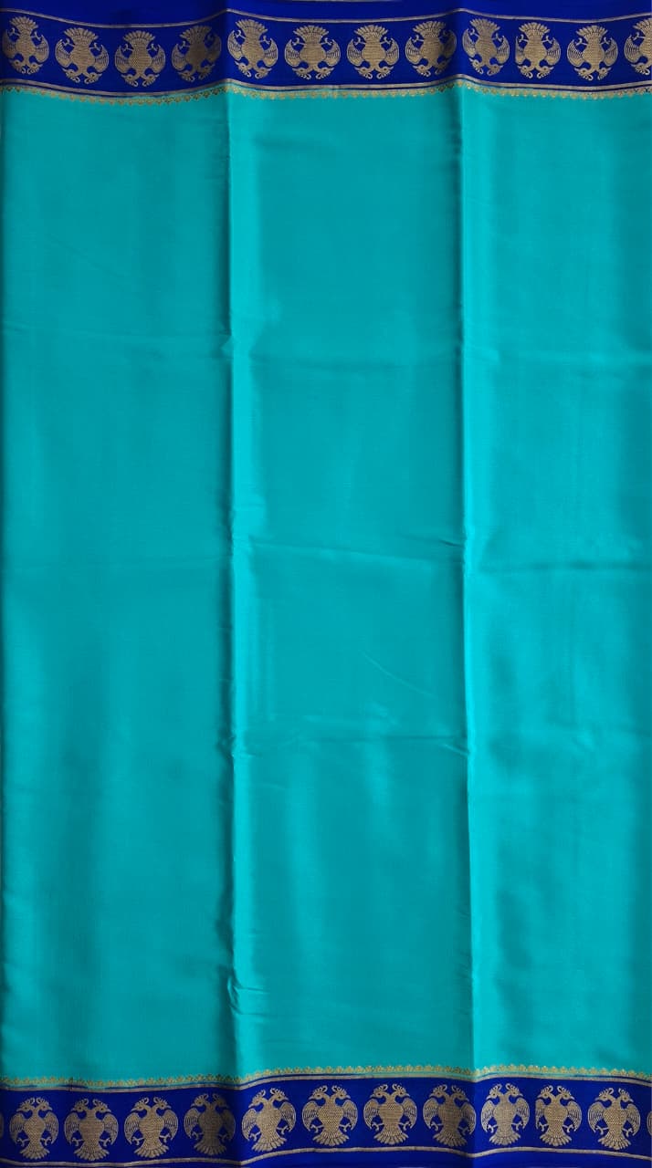 Sky Blue Mysore Crepe Silk with darke border-gandberunda motifs